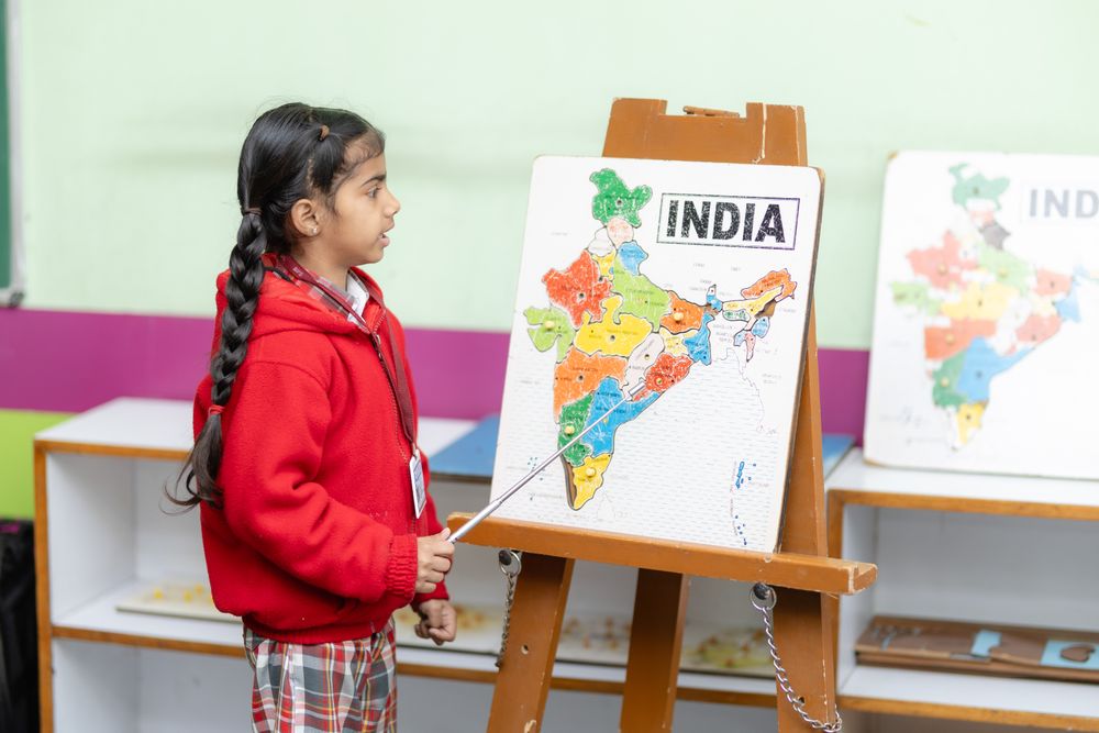 Student presenting the map of India in class