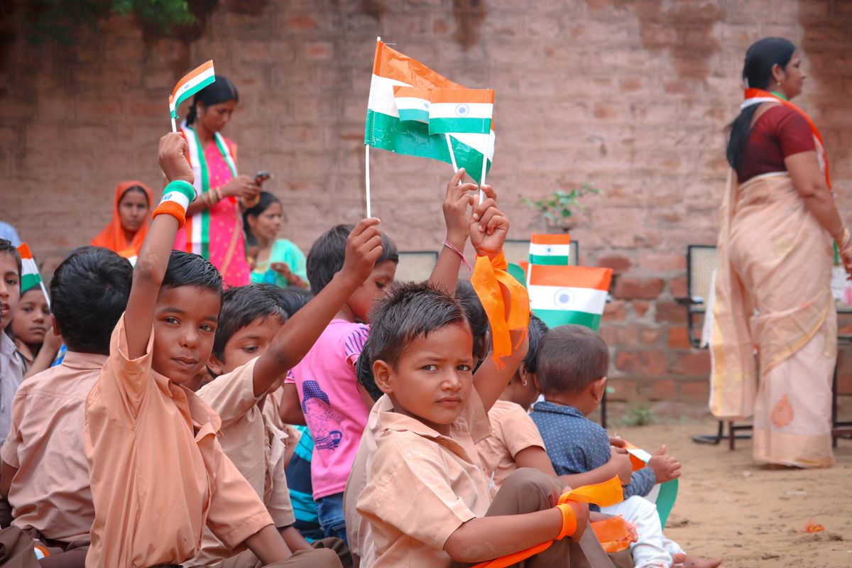 Children waving the Indian flag on Independence Day