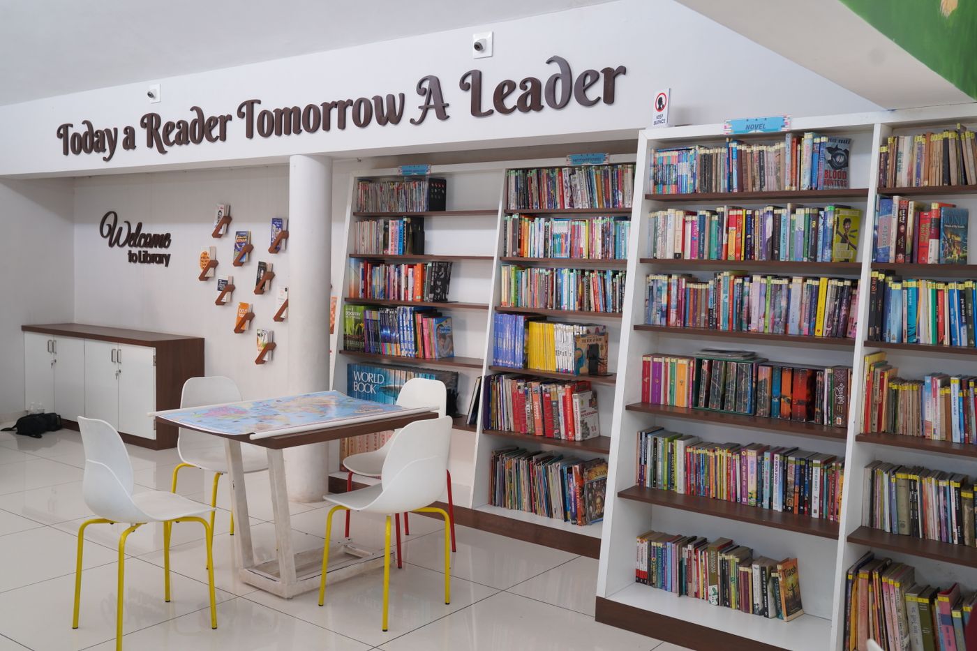 School library with bookshelves and reading tables
